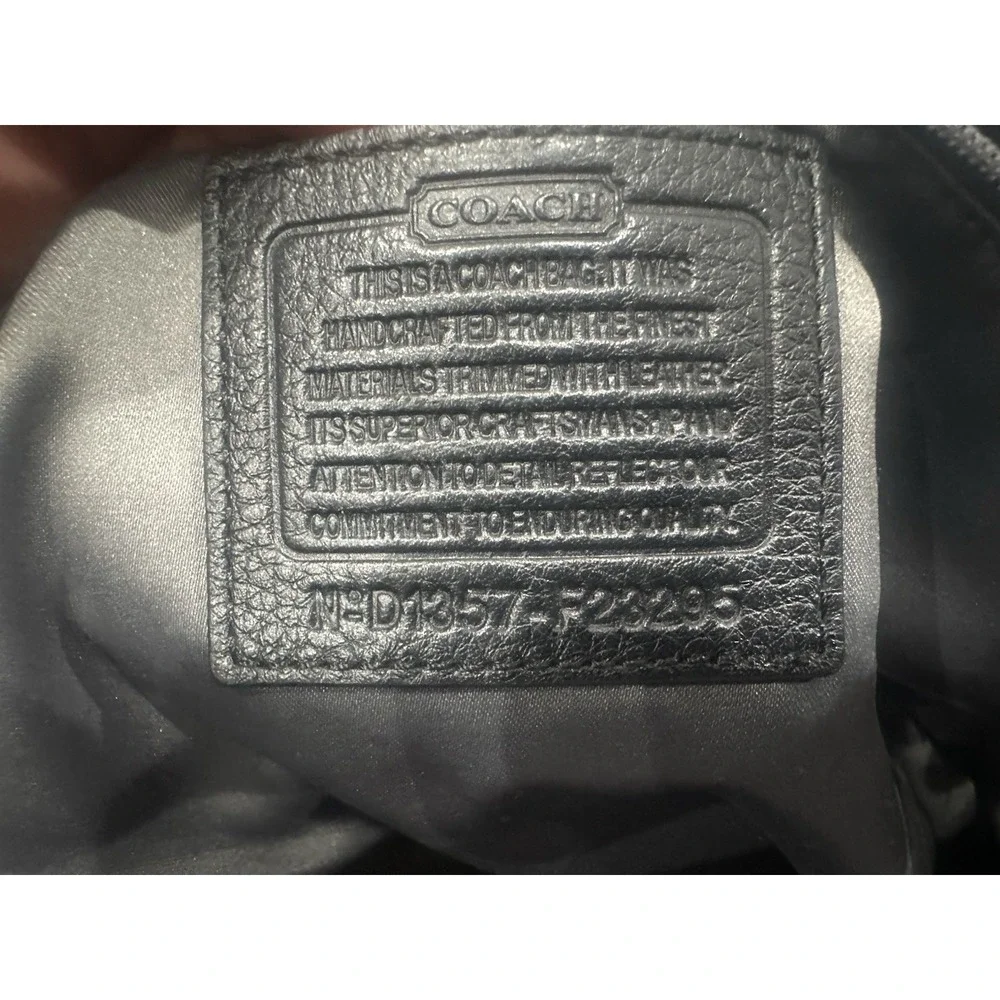 Coach black signature